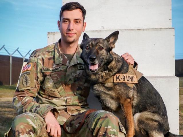 U.S. Army Cpl. Dustin Borchardt with military working dog named Pearl