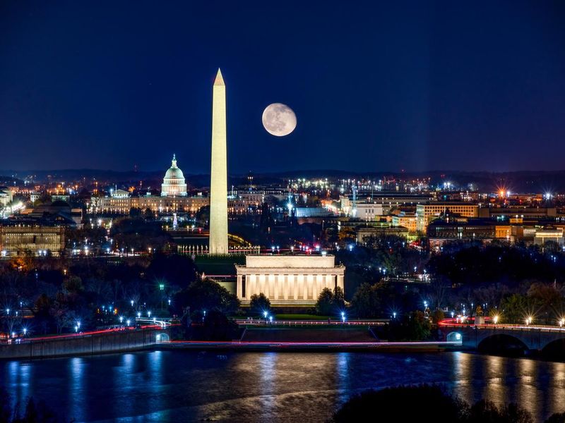 View of Washington, D.C., with a full moon