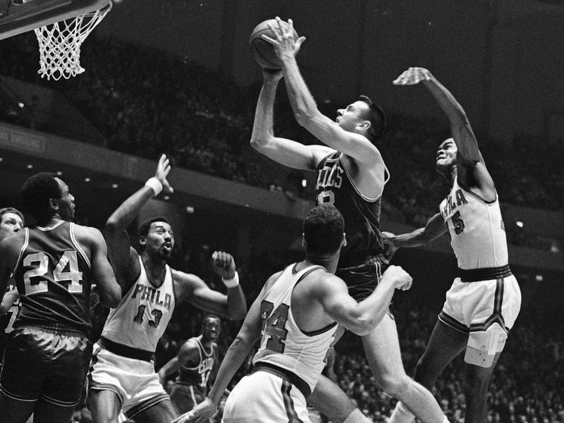 Wally Jones and Hal Greer in action against Boston Celtics