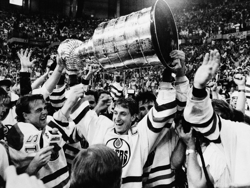Wayne Gretzky celebrates with Stanley Cup