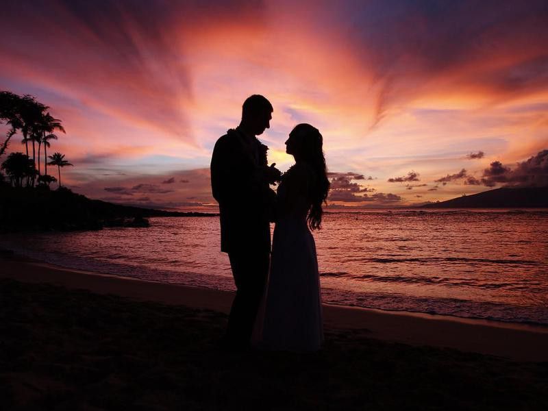 Wedding silhouette on sunset tropical beach