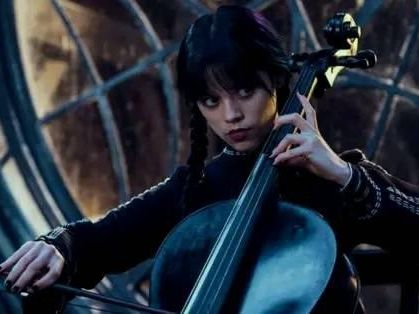 Wednesday Addams playing the cello