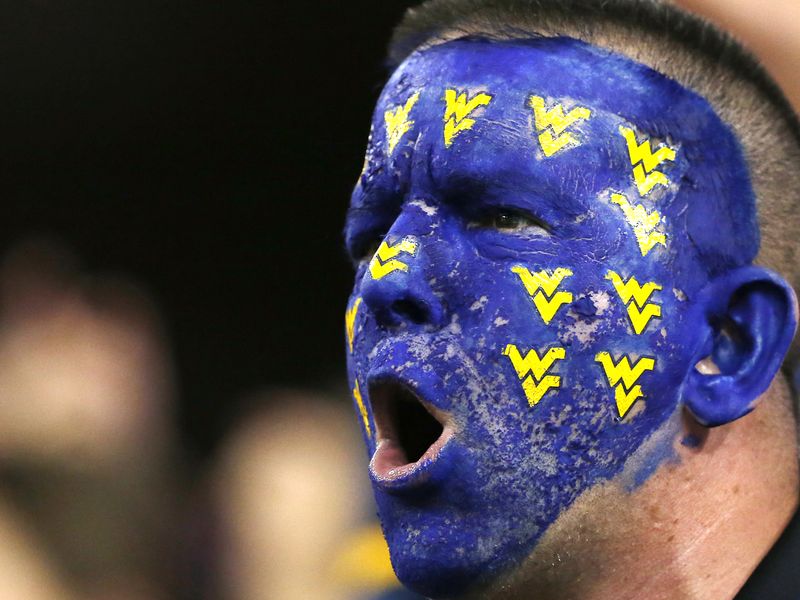 West Virginia fan with painted face