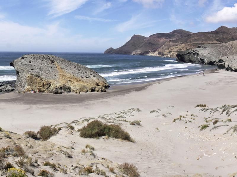 Wide view of dunes and beach of Playa de Monsul