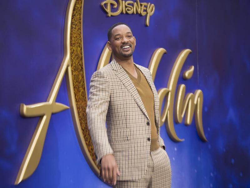 Will Smith poses for photographers at 'Aladdin' European Gala
