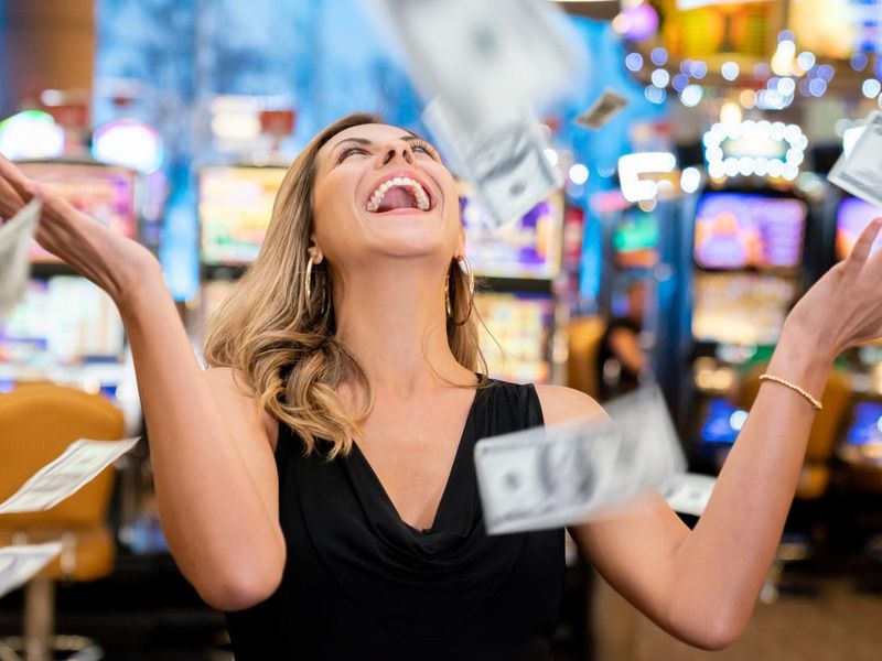 Woman excited about all the money she won on slot machines