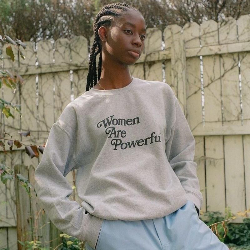 Woman in women are powerful sweatshirt