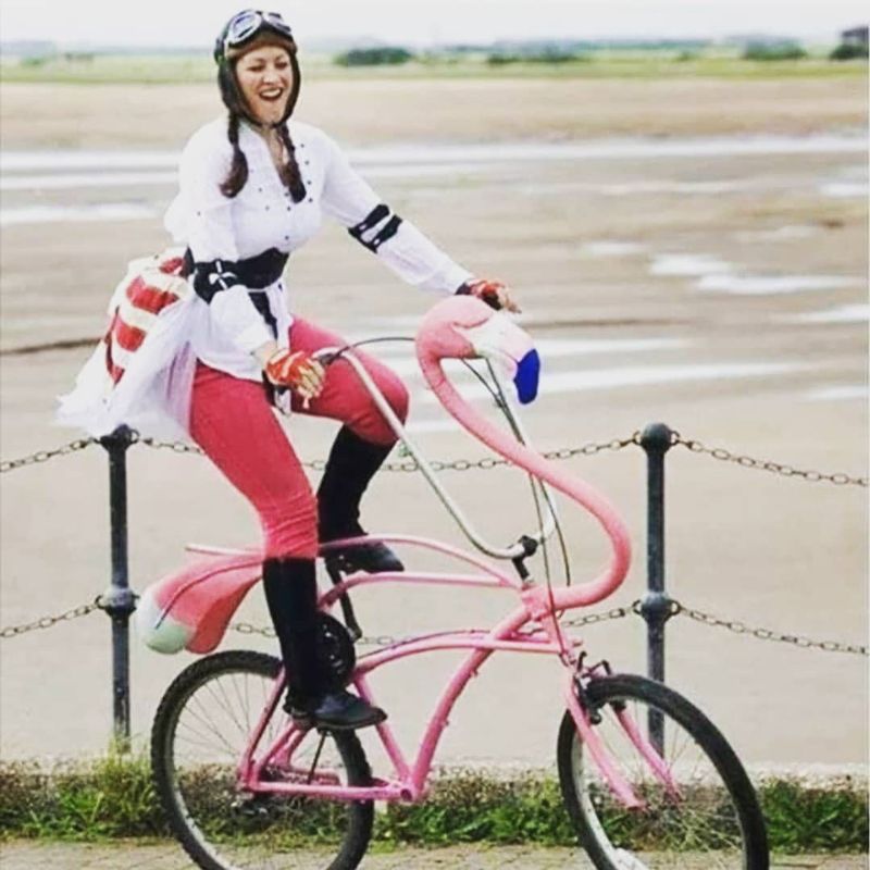 Woman on flamingo bike
