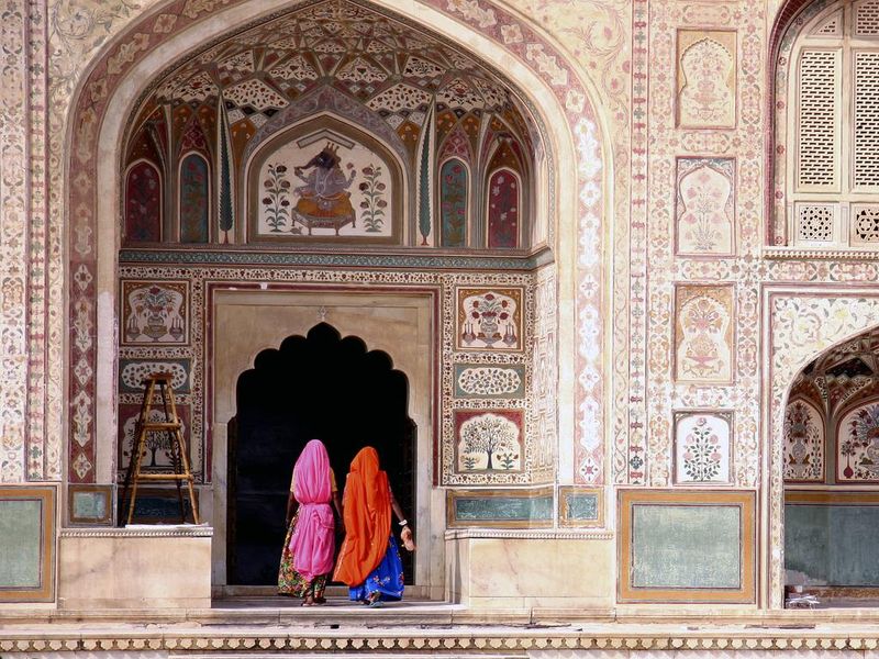 Women walking into Amber Fort in Jaipur, India