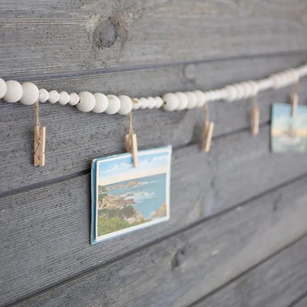 Wooden bead with clothespins garland