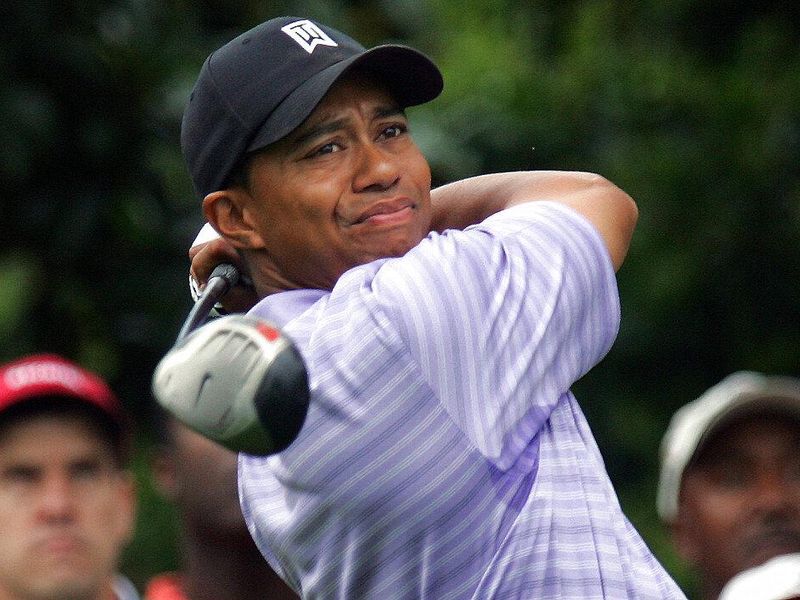 Woods with nike driver