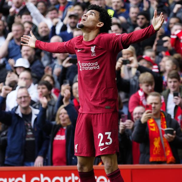 Liverpool's Luis Diaz celebrates after scoring his side's second goal during an English Premier League soccer match between Liverpool and Tottenham Hotspur at Anfield stadium in Liverpool, Sunday, April 30, 2023. (AP Photo/Jon Super)