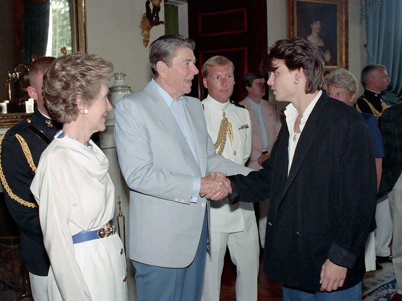 Young Johnny Depp meeting with President Ronald Reagan