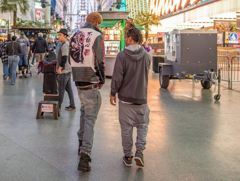 Young stylish men on Fremont Street in Las Vegas